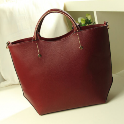 Vintage Women Designer Leather Red Handbag..