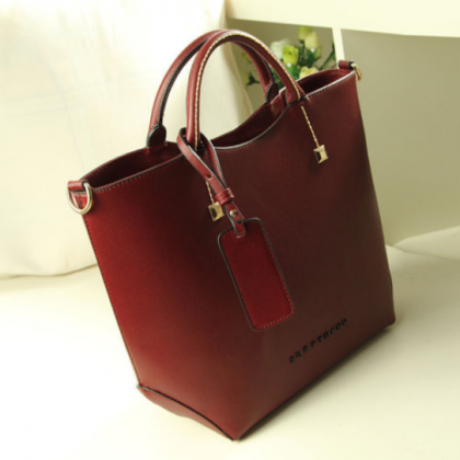Vintage Women Designer Leather Red Handbag..